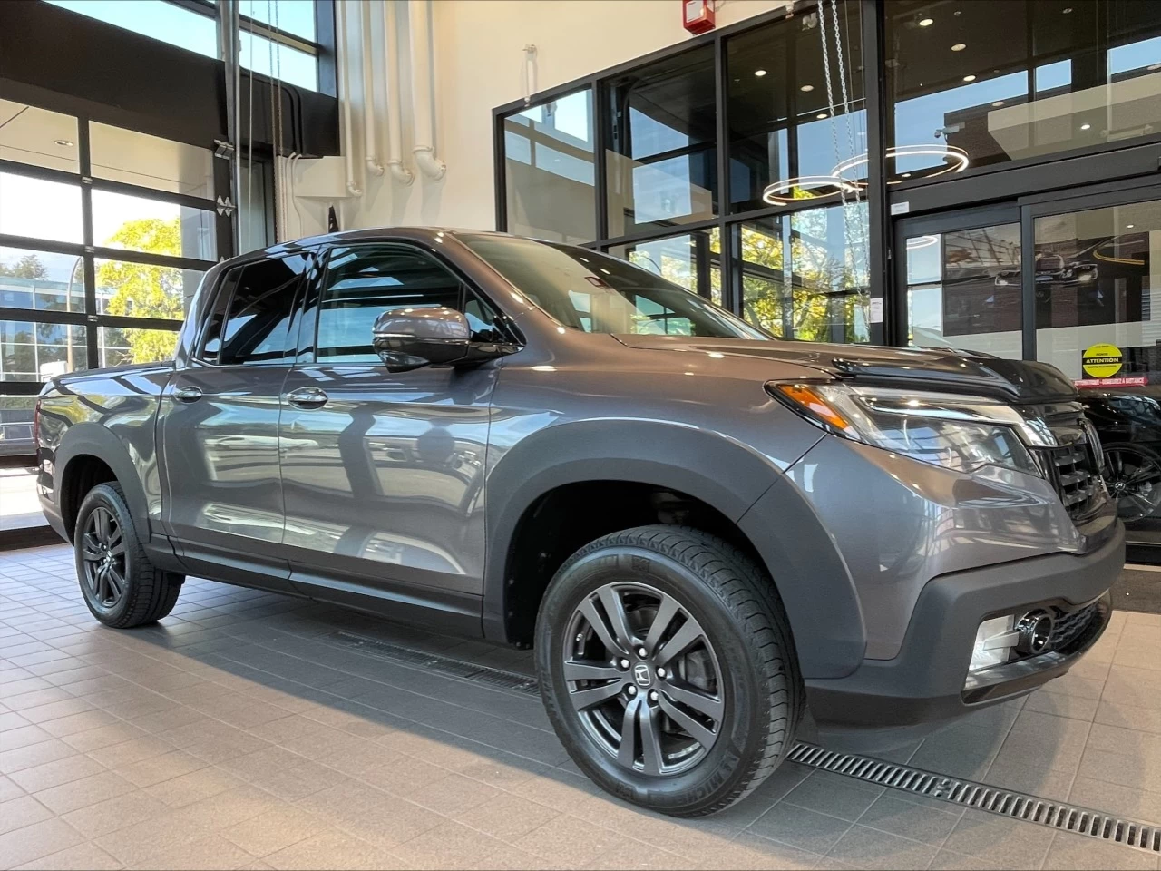 2020 Honda Ridgeline Sport https://www.acuramontrealcentre.com/resize/b990ff35b810a3abc0cc817b2ca24889-1