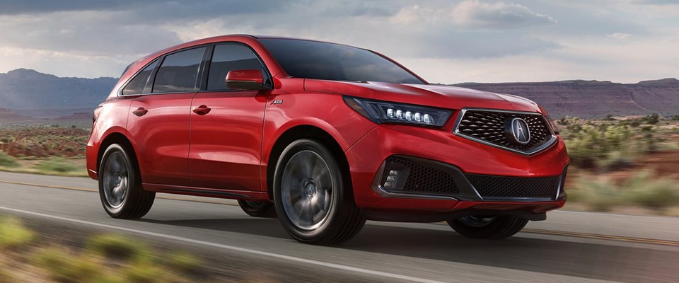 MDX 2020 rouge sur une route