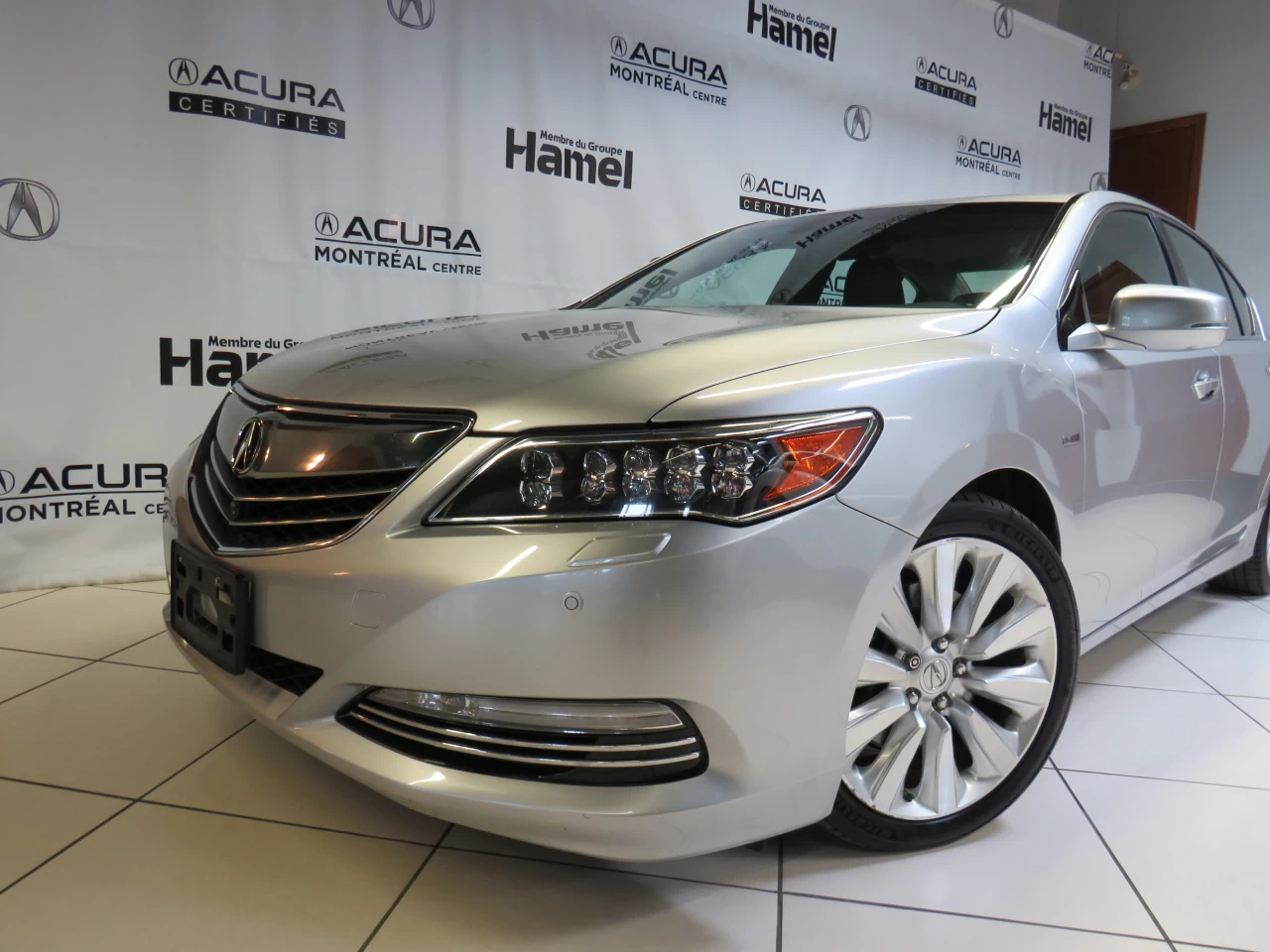 2015 Acura RLX Sport Hybrid https://www.acuramontrealcentre.com/resize/b990ff35b810a3abc0cc817b2ca24889-1
