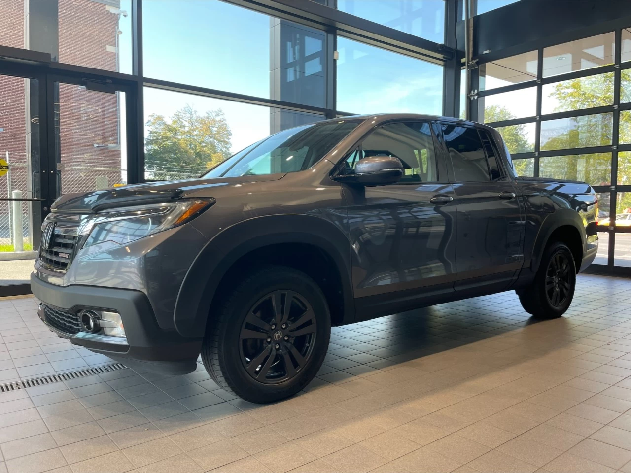 2020 Honda Ridgeline Sport https://www.acuramontrealcentre.com/resize/b990ff35b810a3abc0cc817b2ca24889-1